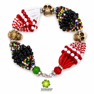 PULSERA ORISHA SHANGO DE 18 HILOS CON CAMANO DE MUERTO EN ZENSARA